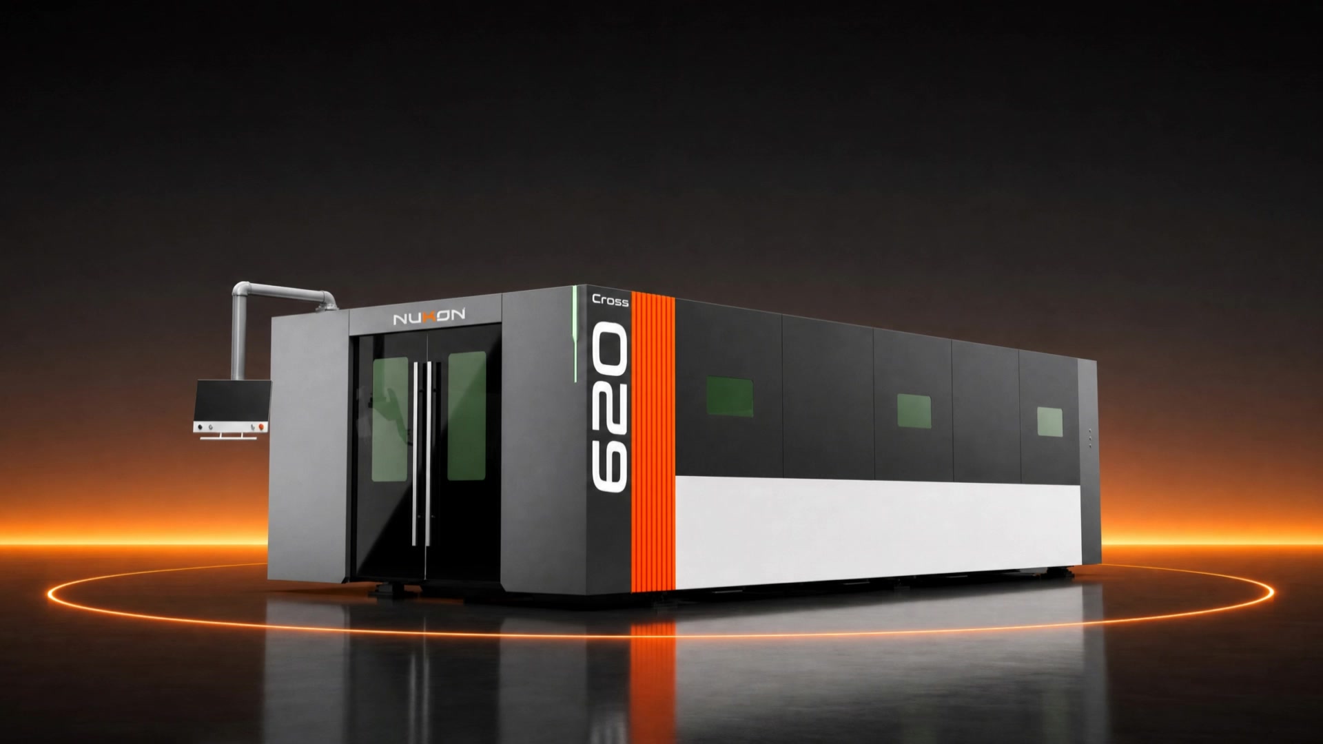 Cross 620 fiber laser cutting system on a lit turntable, orange horizon glow behind it